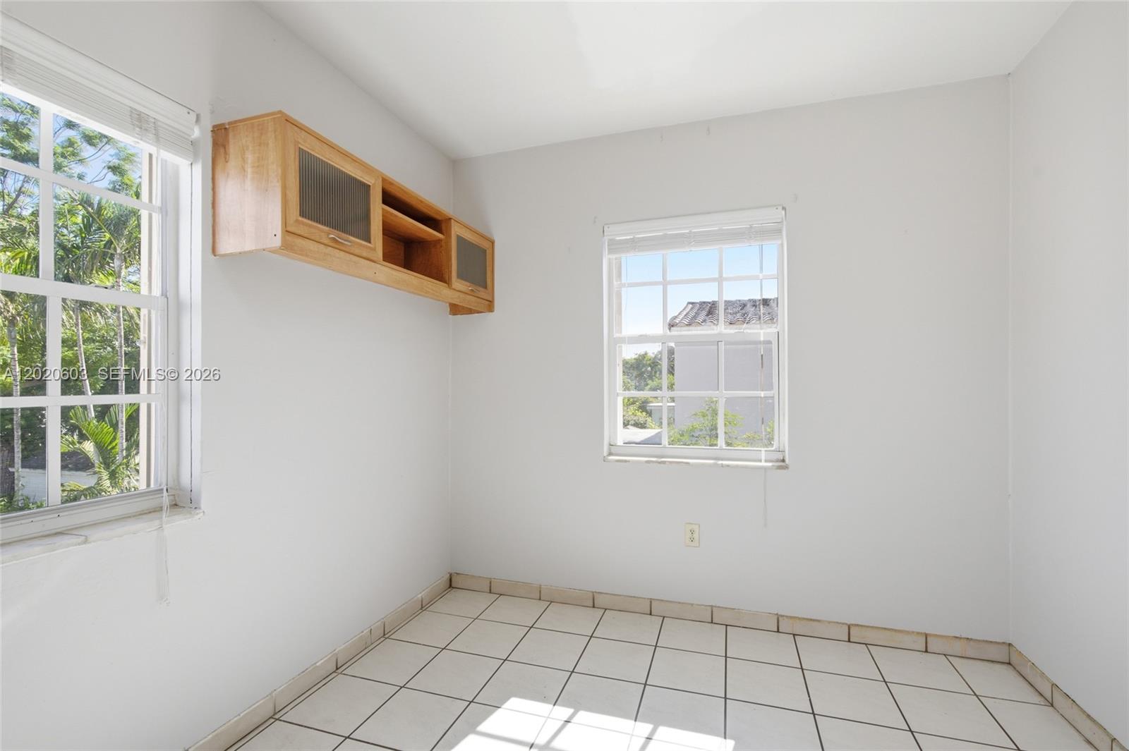 3750 Southwest 27th Street Miami, FL 33134 - Photo 22 of 41 a view of an empty room with a window