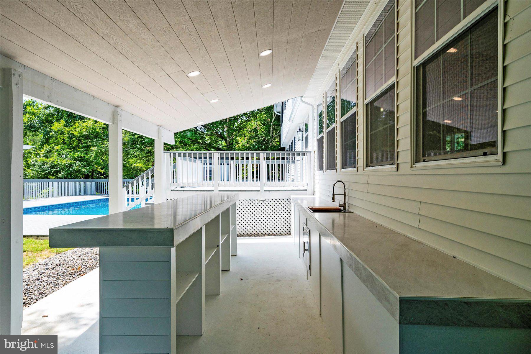 1683 Paris Oaks Road Owings, MD 20736 - Photo 33 of 59 Recessed lights over bar