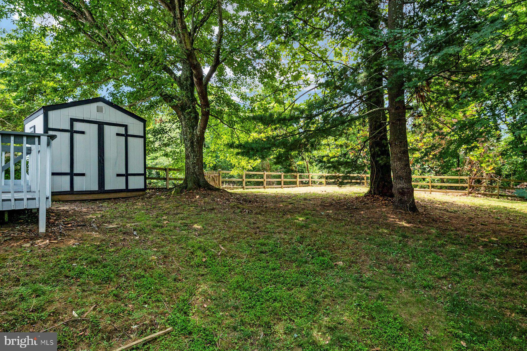 1683 Paris Oaks Road Owings, MD 20736 - Photo 57 of 59 Large shed and fenced in side yard