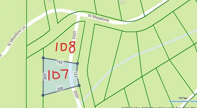 a sign board with a street sign