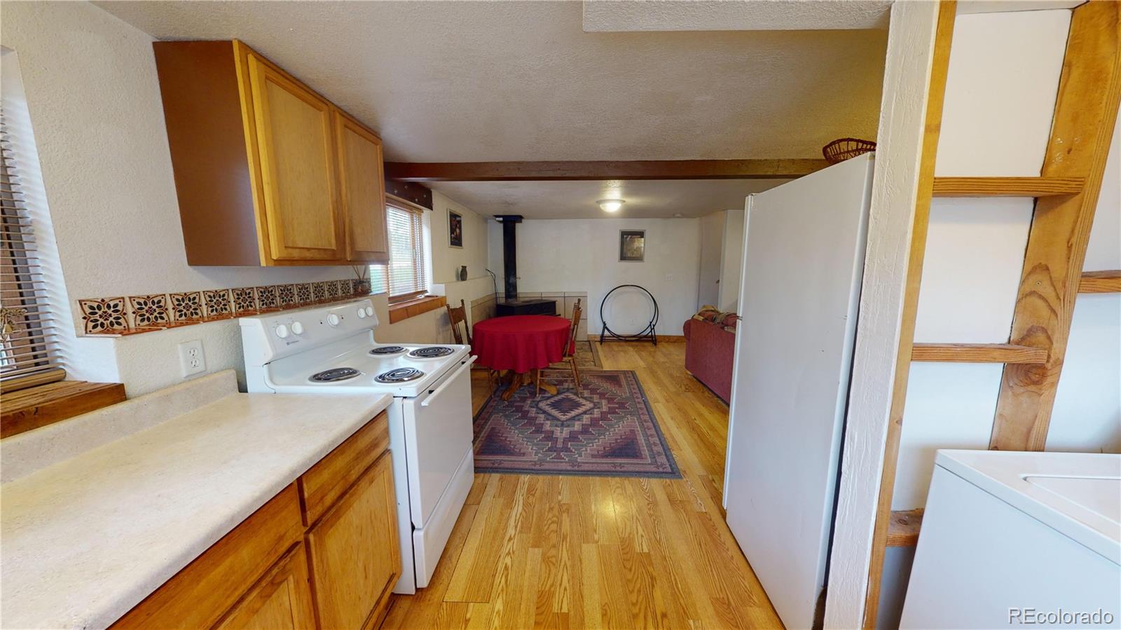 1011 Castle Ridge View Cripple Creek, CO 80813 - Photo 21 of 40 a bathroom with a sink and a mirror