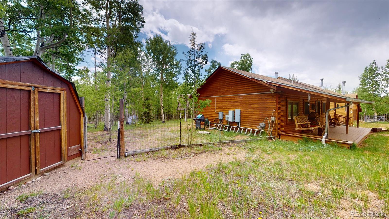 1011 Castle Ridge View Cripple Creek, CO 80813 - Photo 4 of 40 a view of a house with backyard