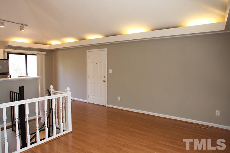 3449 Mill Run, Unit 3449 Raleigh, NC 27612 - Photo 3 of 12 a view of hallway with wooden floor