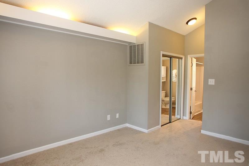 3449 Mill Run, Unit 3449 Raleigh, NC 27612 - Photo 6 of 12 a view of an empty room