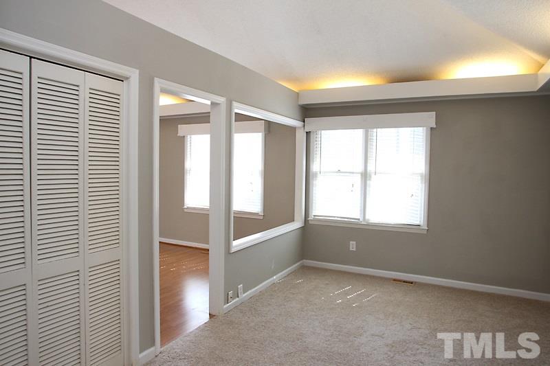 3449 Mill Run, Unit 3449 Raleigh, NC 27612 - Photo 7 of 12 a view of an empty room with a window