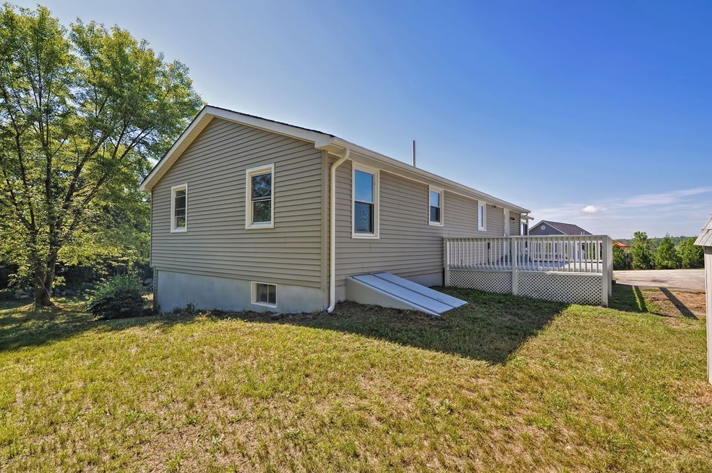 138 Leland Hill Road Sutton, MA 01590 - Photo 3 of 26 a house view with a backyard space