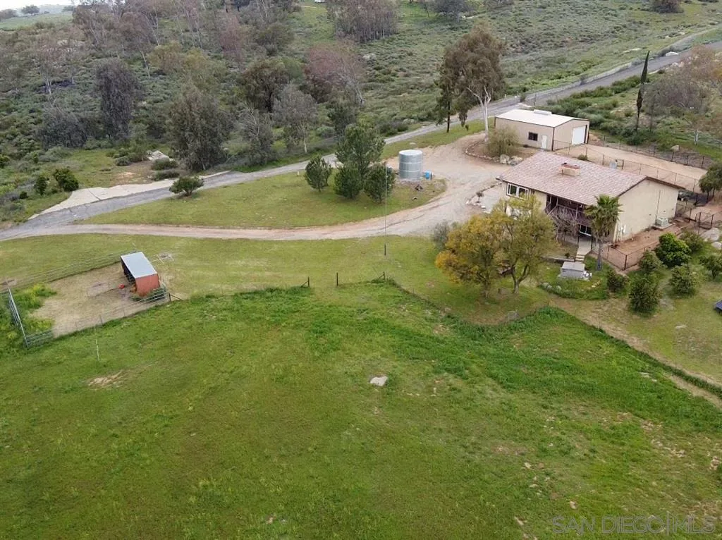 21152 Sutherland Dam Road Ramona, CA 92065 - Photo 1 of 25 an aerial view of a house with a yard