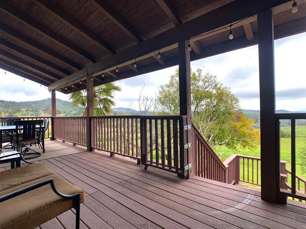 21152 Sutherland Dam Road Ramona, CA 92065 - Photo 23 of 25 a view of porch with wooden floor