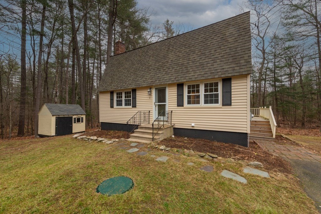 5 Peach Lane Townsend, MA 01469 - Photo 23 of 32 a view of a house with a yard