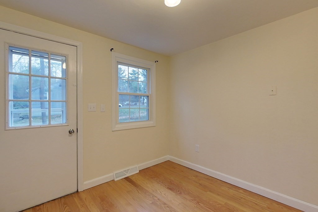5 Peach Lane Townsend, MA 01469 - Photo 4 of 32 an empty room with windows
