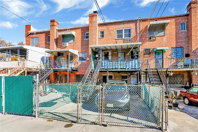 a view of a building with a patio