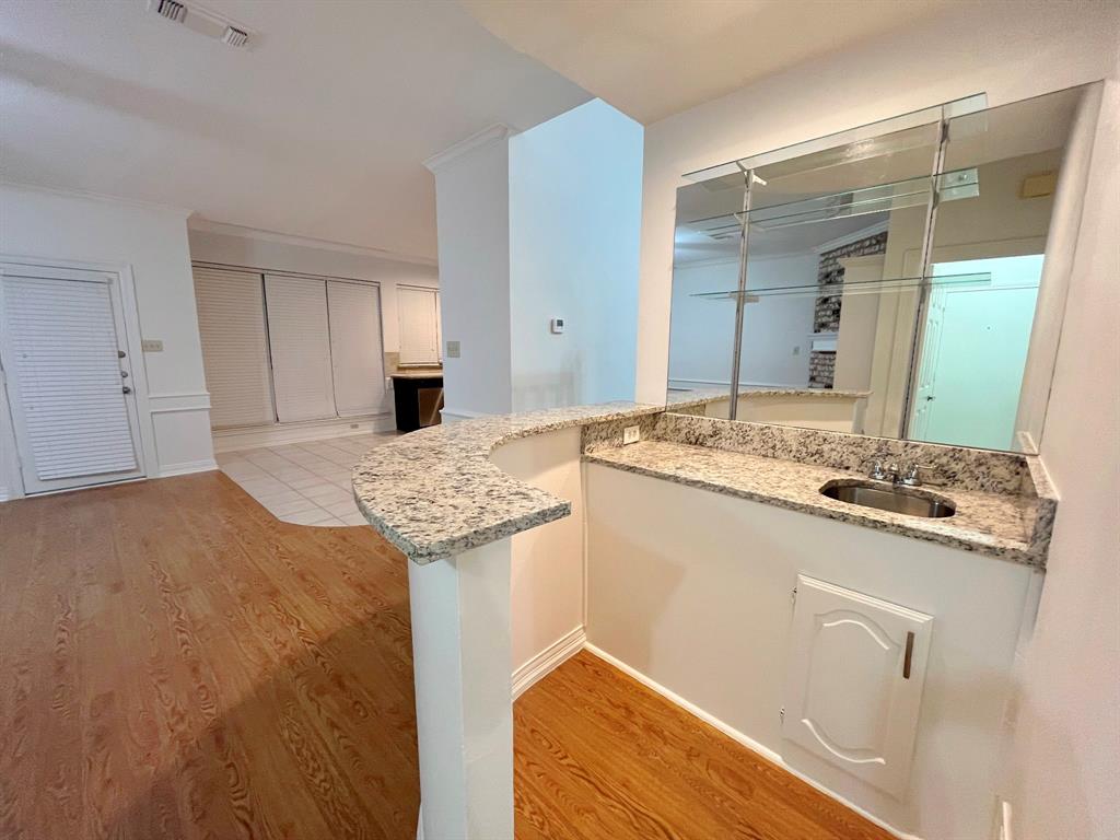 1840 Wind Hill Road Rockwall, TX 75087 - Photo 16 of 28 a bathroom with a sink and a mirror
