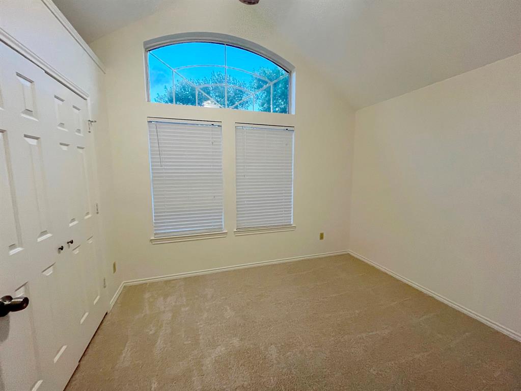1840 Wind Hill Road Rockwall, TX 75087 - Photo 21 of 28 an empty room with a window