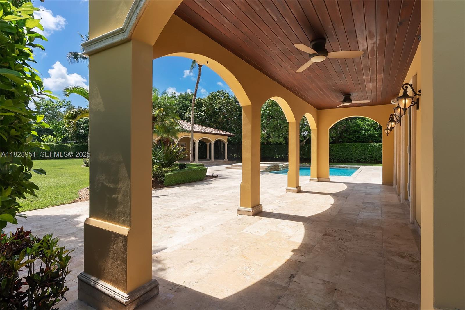 10851 Southwest 63rd Avenue Pinecrest, FL 33156 - Photo 27 of 63 a view of a house with a porch