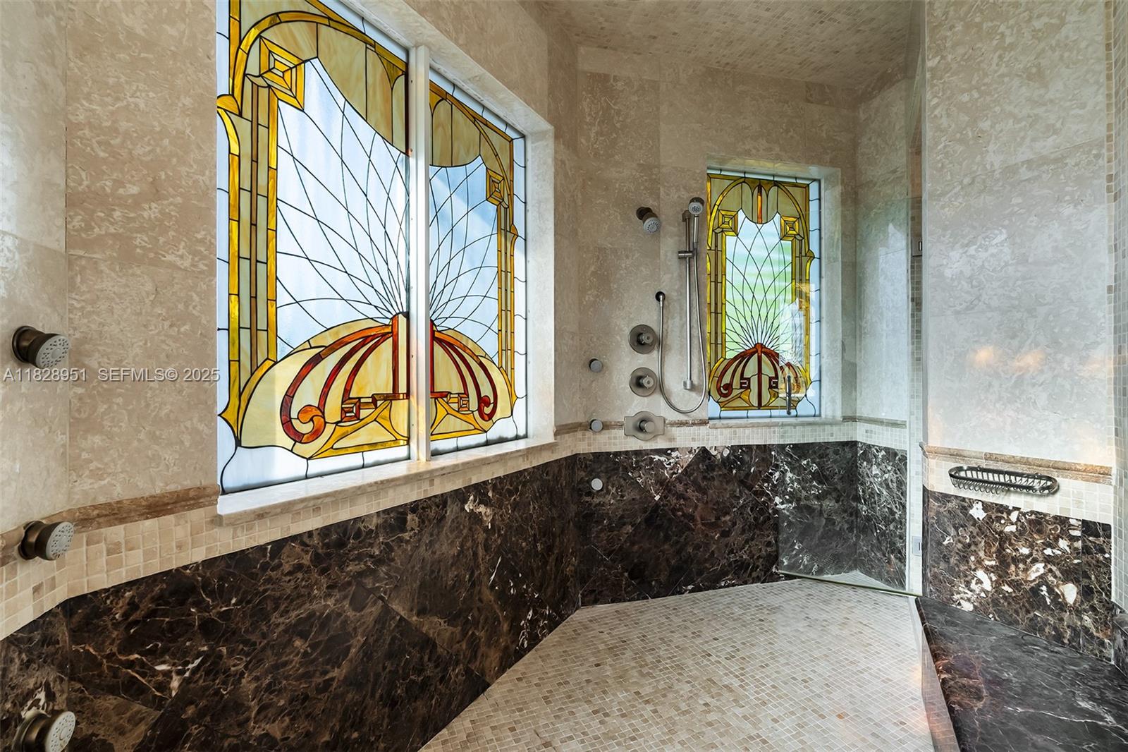 10851 Southwest 63rd Avenue Pinecrest, FL 33156 - Photo 51 of 63 a bathroom with a sink and a mirror