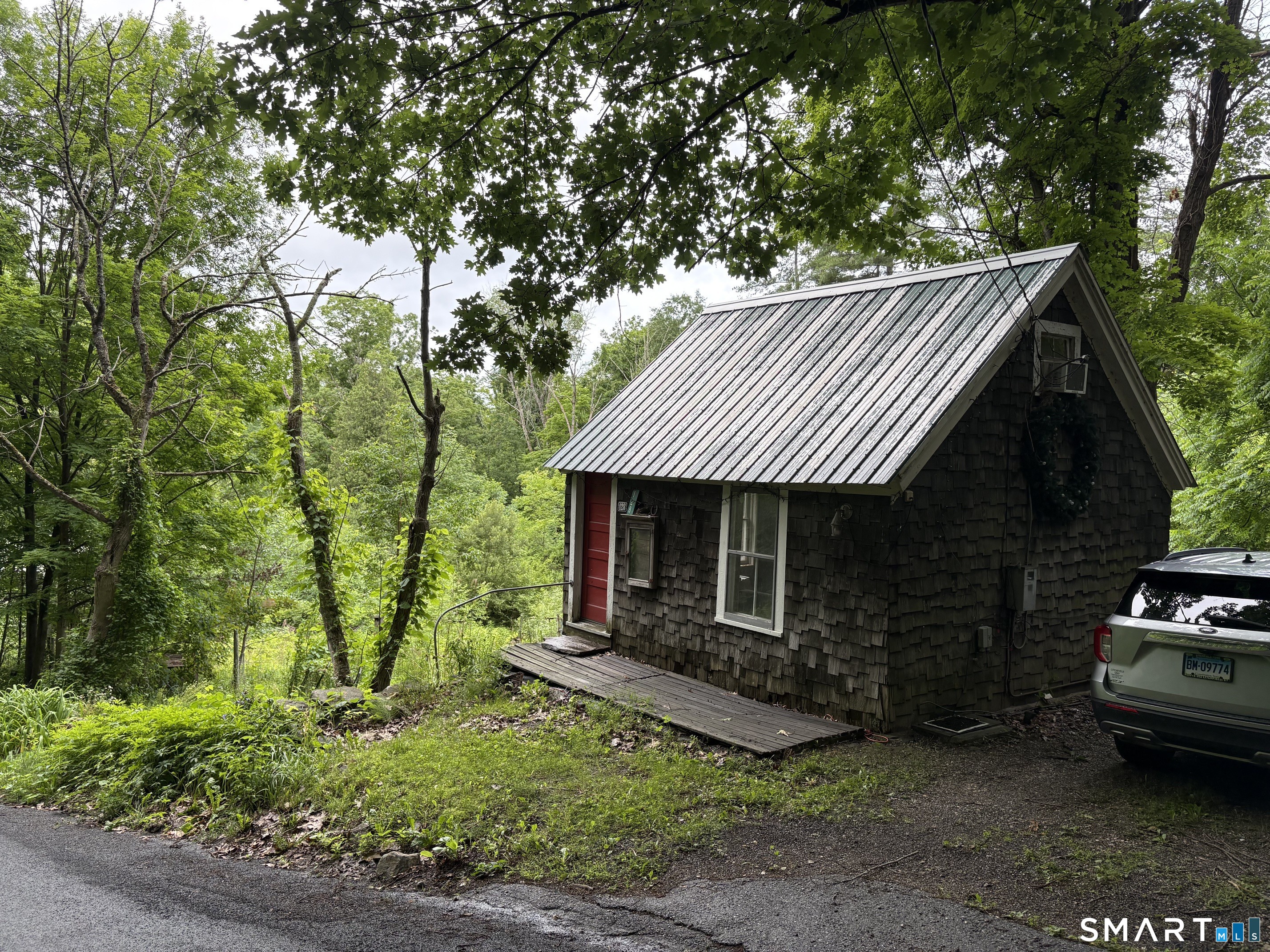 128 Popple Swamp Road Cornwall Bridge, CT 06754 - Photo 3 of 10 Cabin has small driveway and is in good condition-no plumbing or heat!