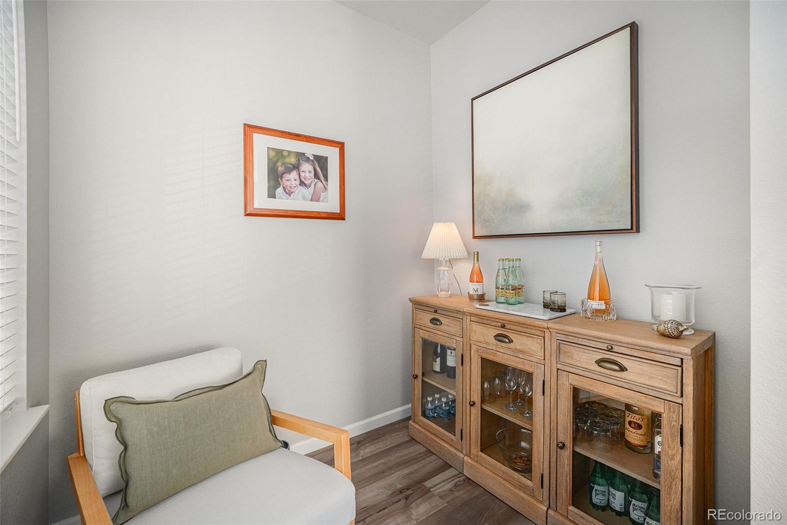 8430 Donati Terrace, Unit A Highlands Ranch, CO 80129 - Photo 15 of 26 a bathroom with a toilet a sink and mirror