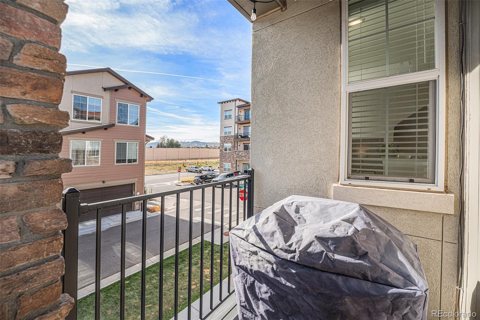 8430 Donati Terrace, Unit A Highlands Ranch, CO 80129 - Photo 7 of 26 a view of a balcony and yard