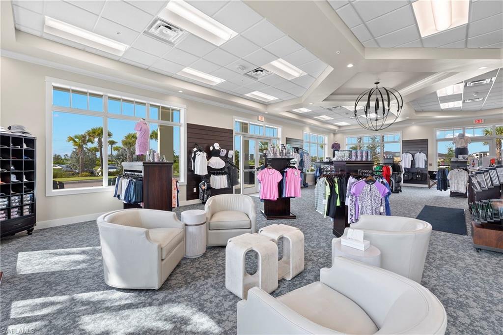 43989 Boardwalk Loop, Unit 2028 Babcock Ranch, FL 33982 - Photo 26 of 47 a living room with furniture and a large window