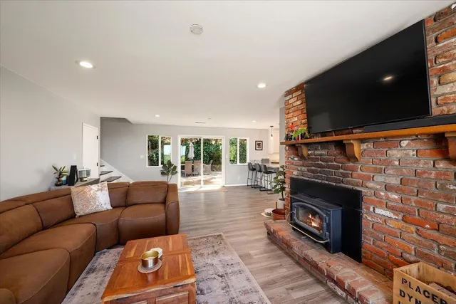 a view of a patio with a table and chairs