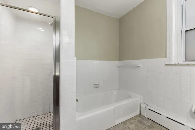 a bathroom with a bathtub