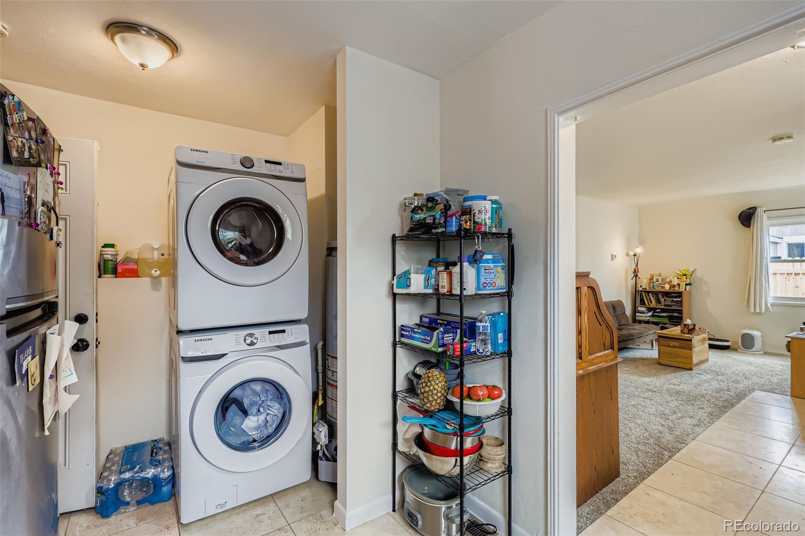452 Perry Street Denver, CO 80204 - Photo 15 of 29 a view of a bedroom with washer and dryer