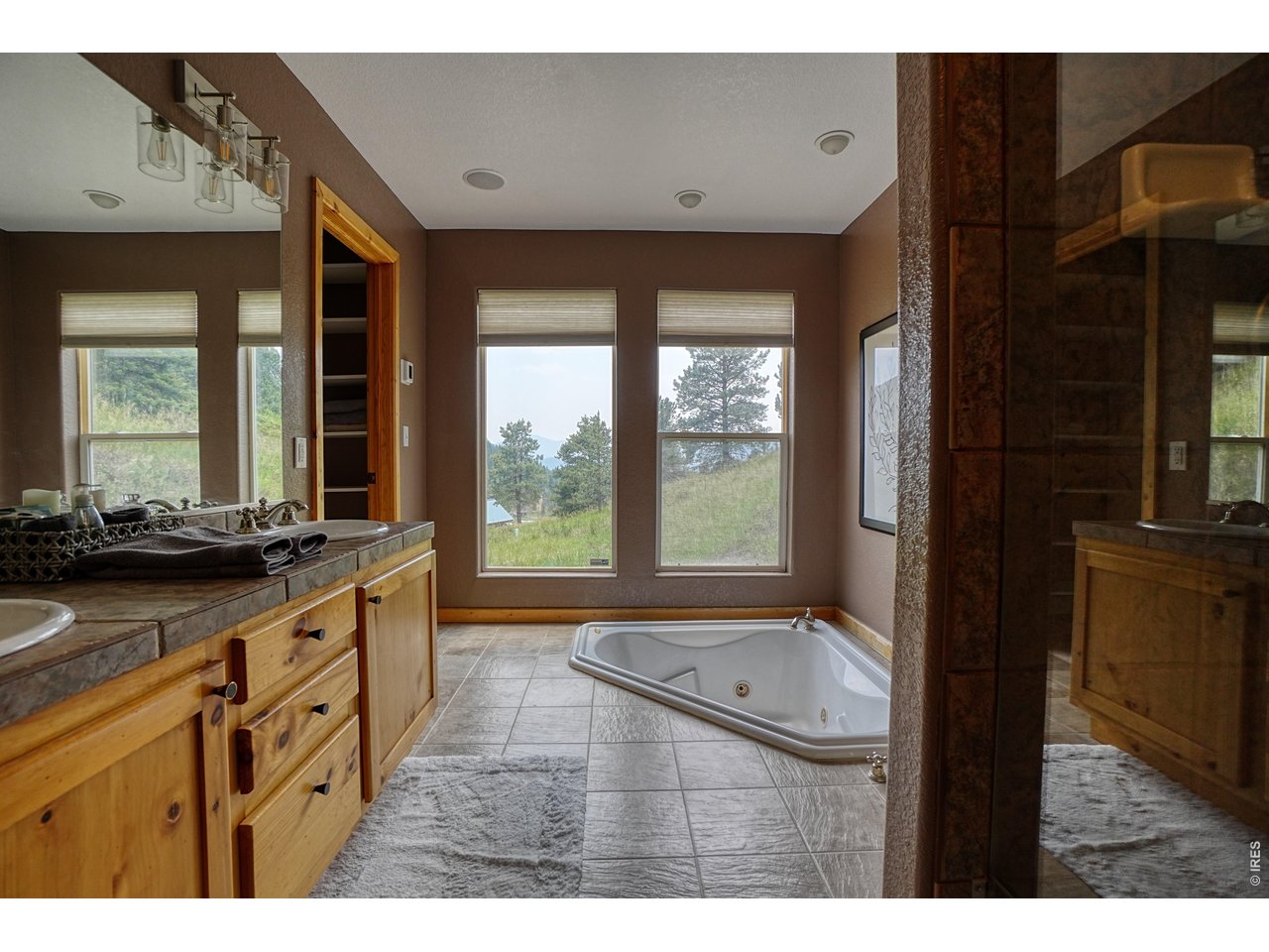 2353 Dory Hill Road Black Hawk, CO 80422 - Photo 19 of 50 Primary, En-suite Bath. Jack & Jill Sinks, dual-head walk-in shower, two person jacuzzi!