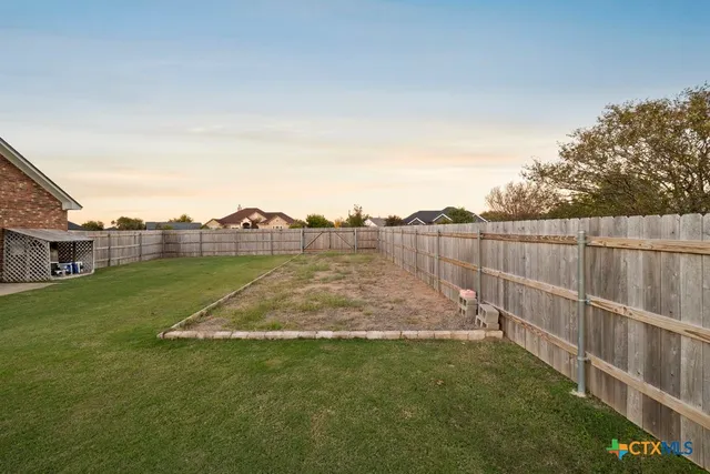 a picture of a bathroom with a sink