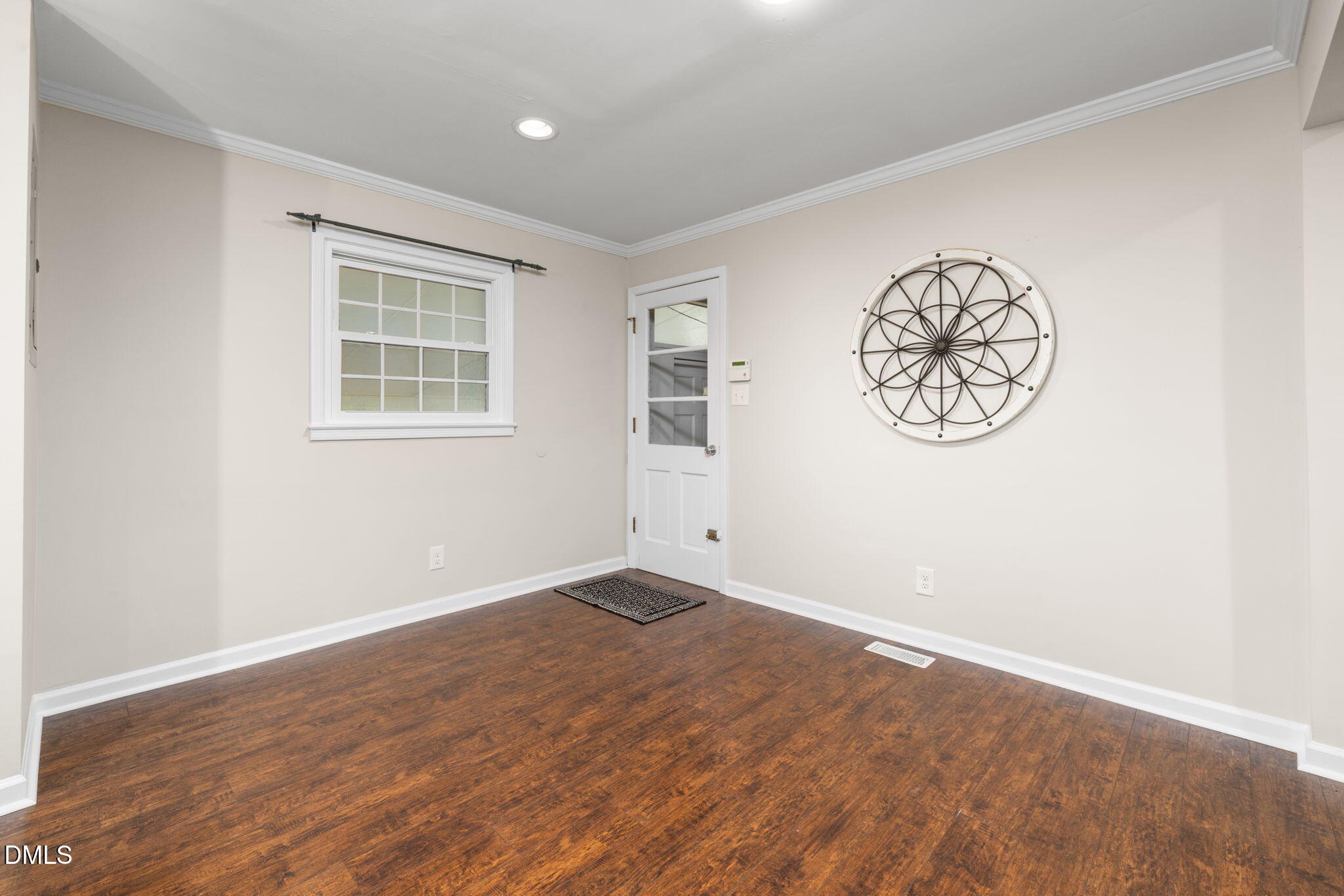 415 Bashford Road Raleigh, NC 27606 - Photo 16 of 33 an empty room with a window