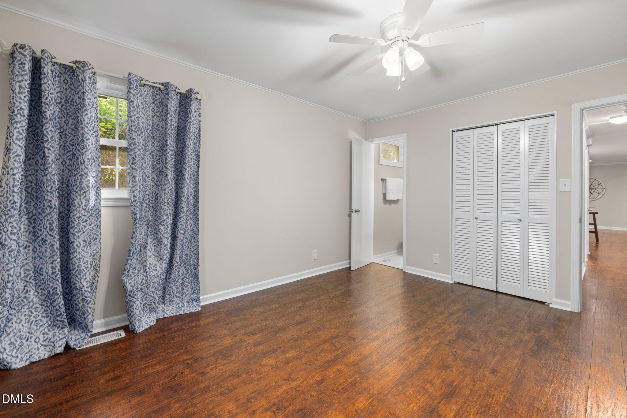 415 Bashford Road Raleigh, NC 27606 - Photo 20 of 33 wooden floor in an empty room with a window