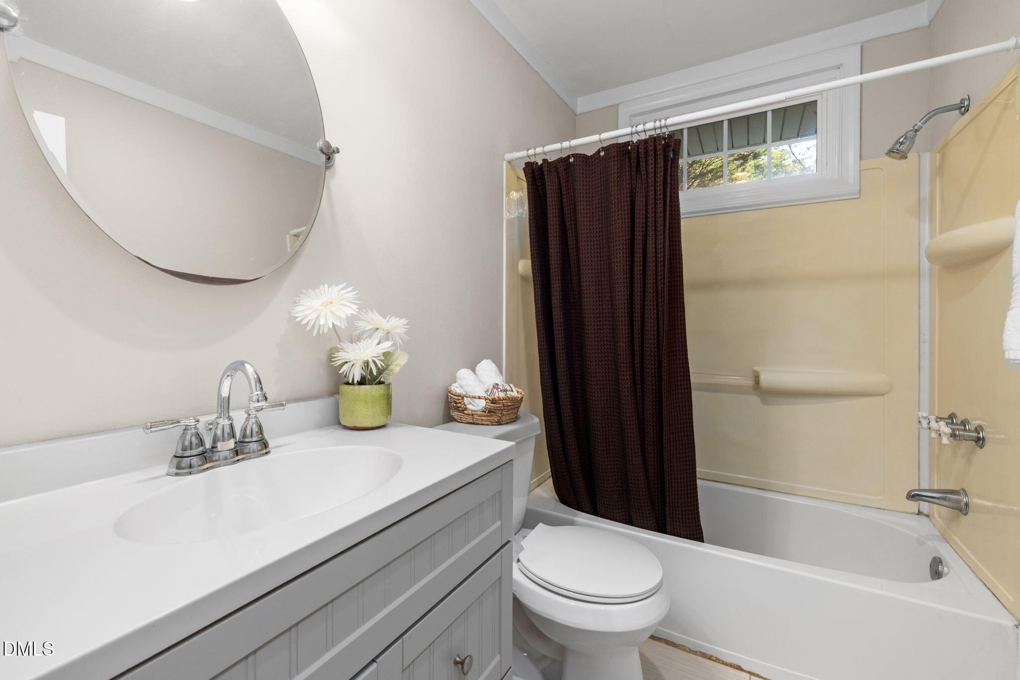 415 Bashford Road Raleigh, NC 27606 - Photo 25 of 33 a bathroom with a sink a toilet and shower