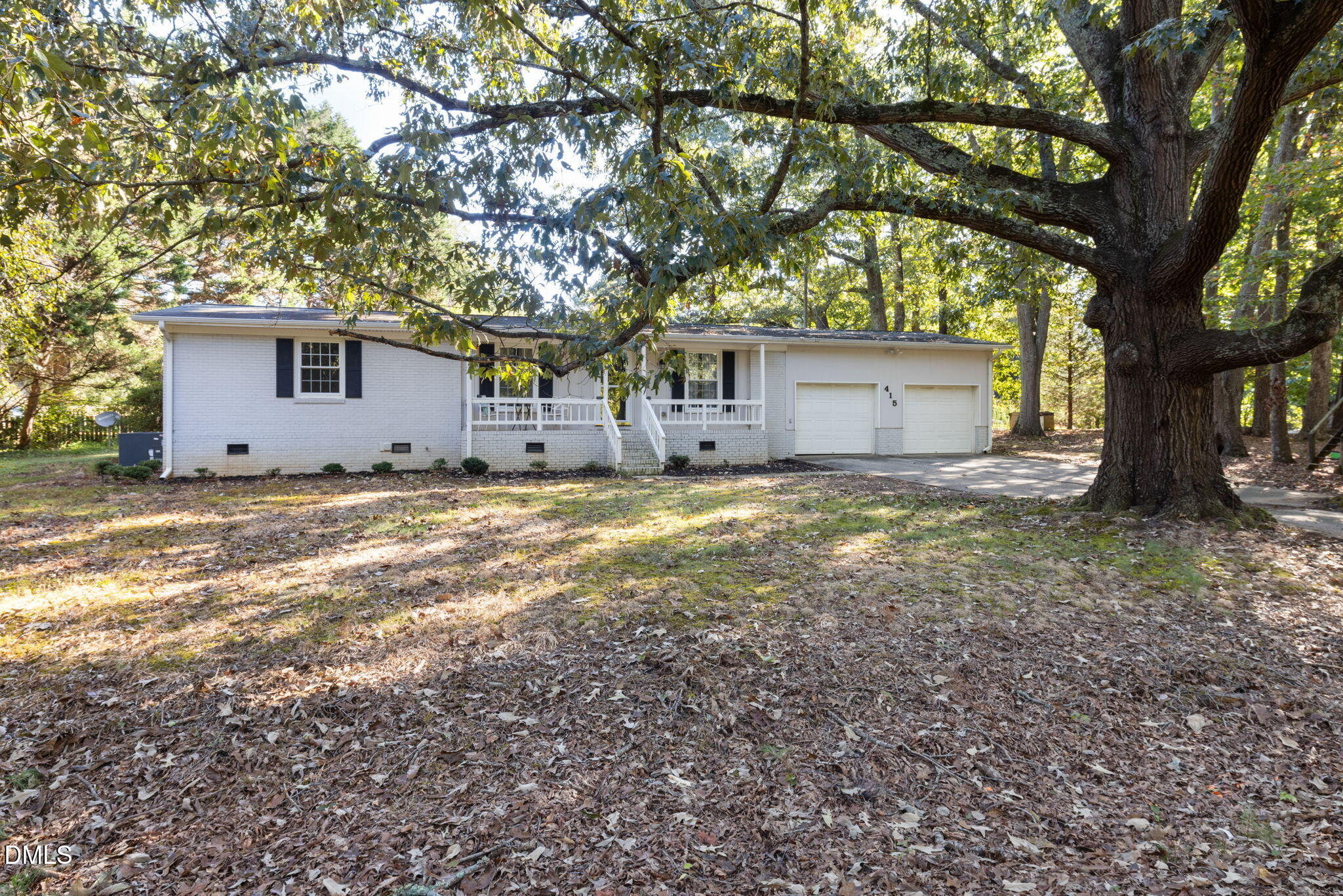 415 Bashford Road Raleigh, NC 27606 - Photo 3 of 33 a house that has a tree in front of it