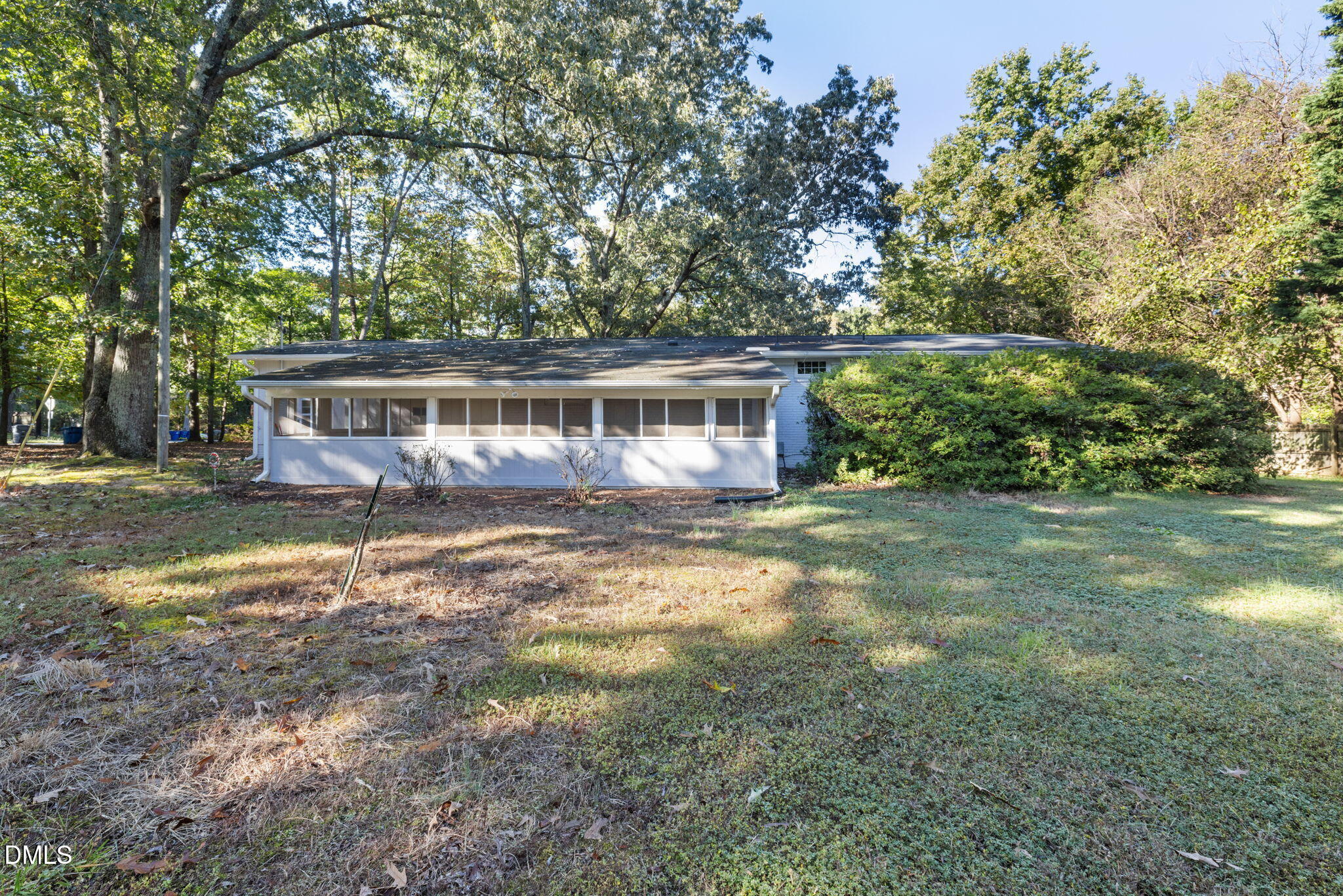 415 Bashford Road Raleigh, NC 27606 - Photo 32 of 33 a view of a house with backyard and sitting area