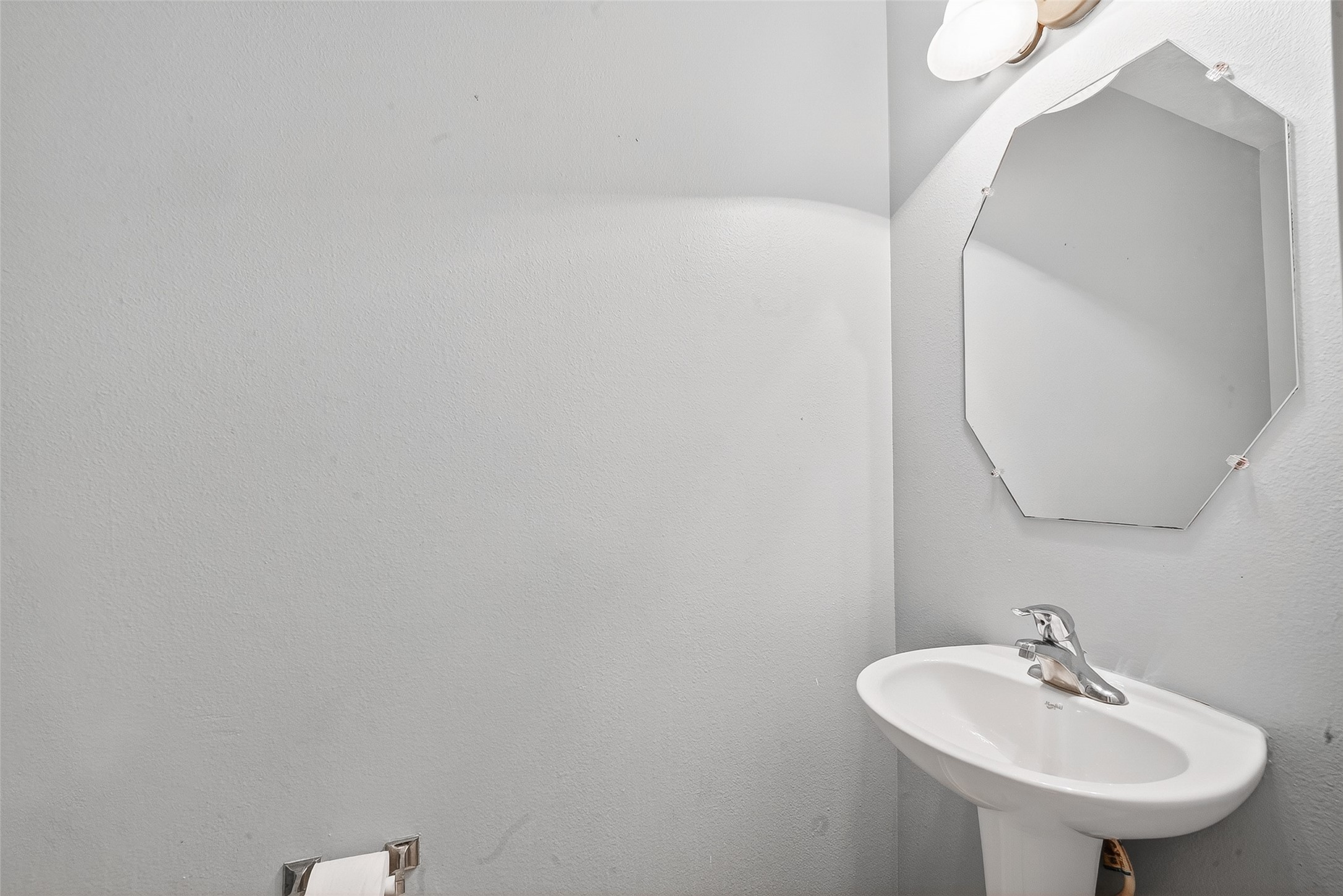 14308 Rocky Briar Lane Rosharon, TX 77583 - Photo 23 of 46 a bathroom with a sink and a mirror