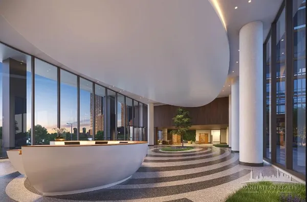 a view of a living room and entry way