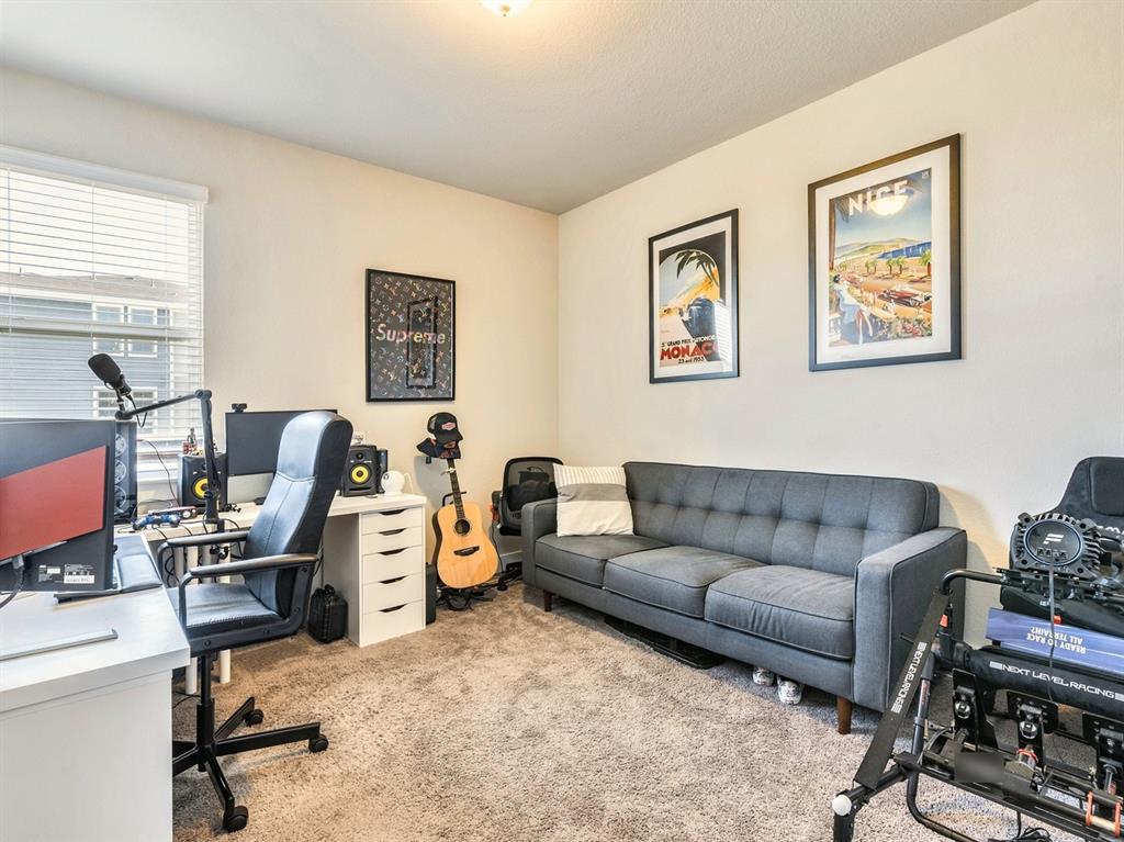 7001 Brick Slope Path Austin, TX 78744 - Photo 18 of 27 Office with light colored carpet