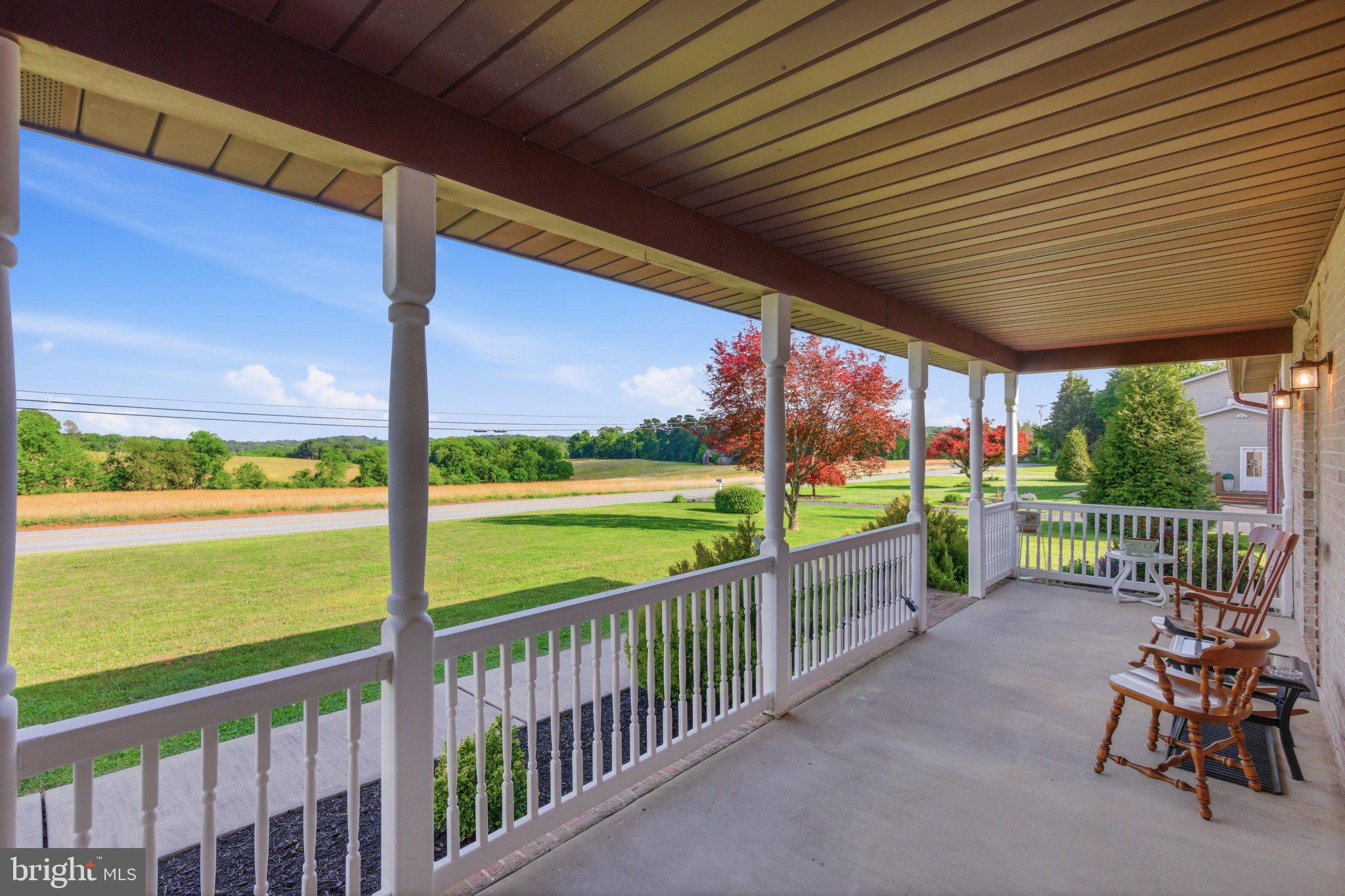 18310 Upper Beckleysville Road Hampstead, MD 21074 - Photo 11 of 67 Charming porch with scenic views.