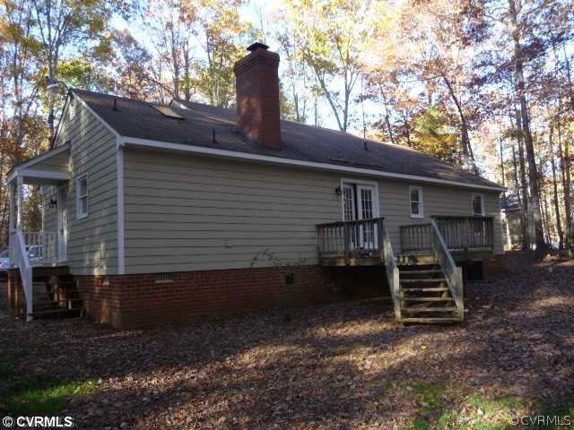 635 Rock Spring Road Bumpass, VA 23024 - Photo 4 of 5 Exterior Back - French doors walk out to wood deck