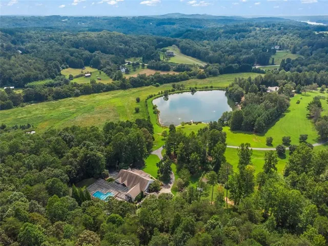 an aerial view of residential house with outdoor space and street view