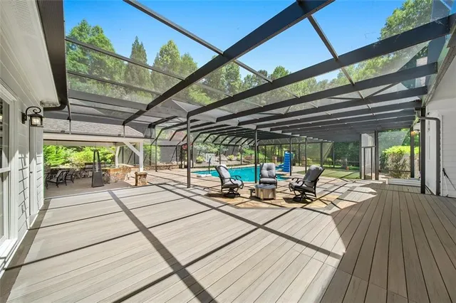 a spacious bedroom with a bed and a window