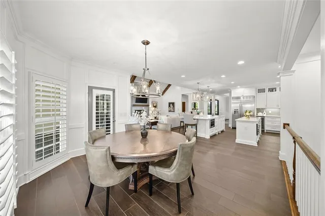a view of a kitchen with a sink and cabinets