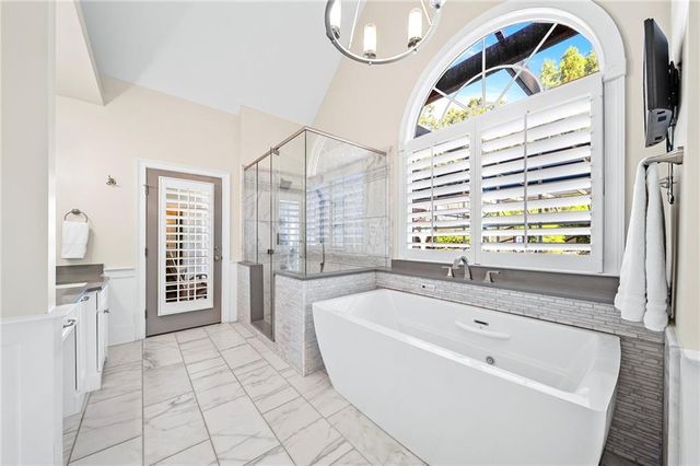 a view of a swimming pool with a patio