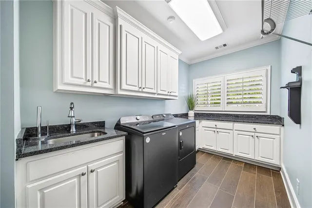 a view of a house with backyard and porch