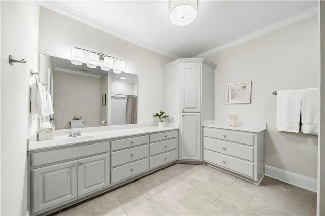 a view of a lake with houses in the back