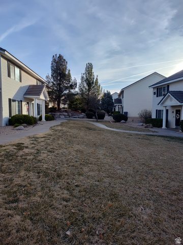 1735 West 540 North, Unit 1402 St. George, UT 84770 - Photo 14 of 14 View of grassy yard featuring a residential view
