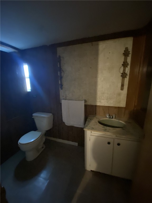 421 Northeast 5th Street Premont, TX 78375 - Photo 12 of 17 a bathroom with a toilet and a sink