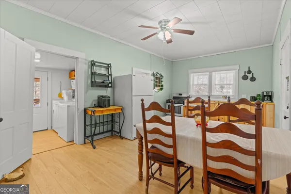 a view of a dining room with furniture