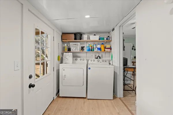 a storage room with washer and dryer