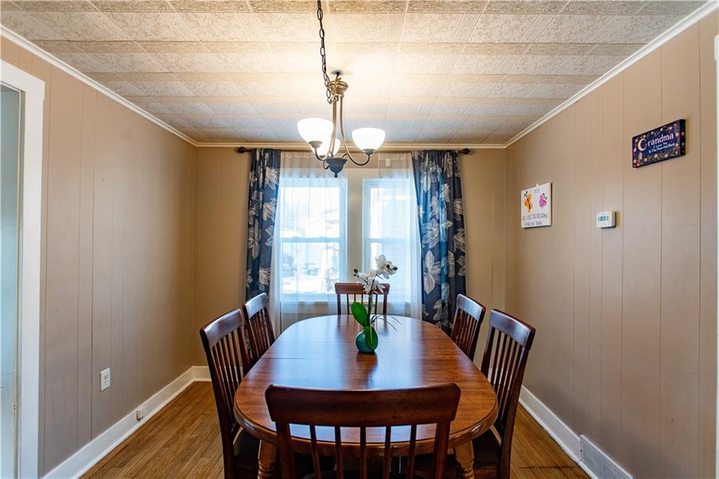 1146 Chestnut Street Monaca, PA 15061 - Photo 11 of 37 a view of a dining room with furniture window and wooden floor