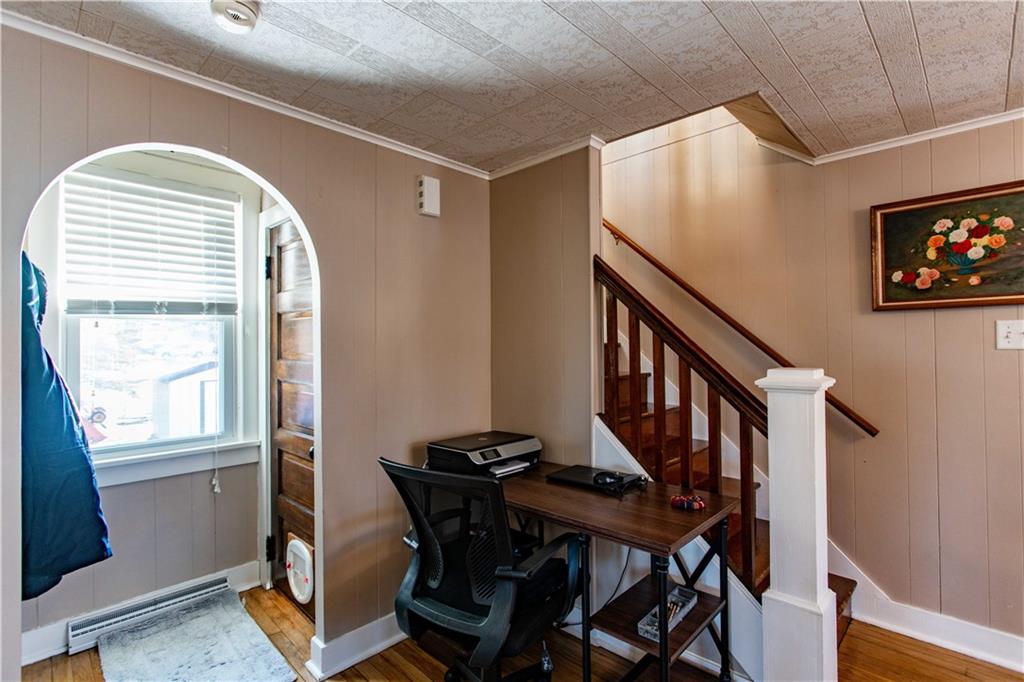 1146 Chestnut Street Monaca, PA 15061 - Photo 16 of 37 a view of a workspace with furniture and a window